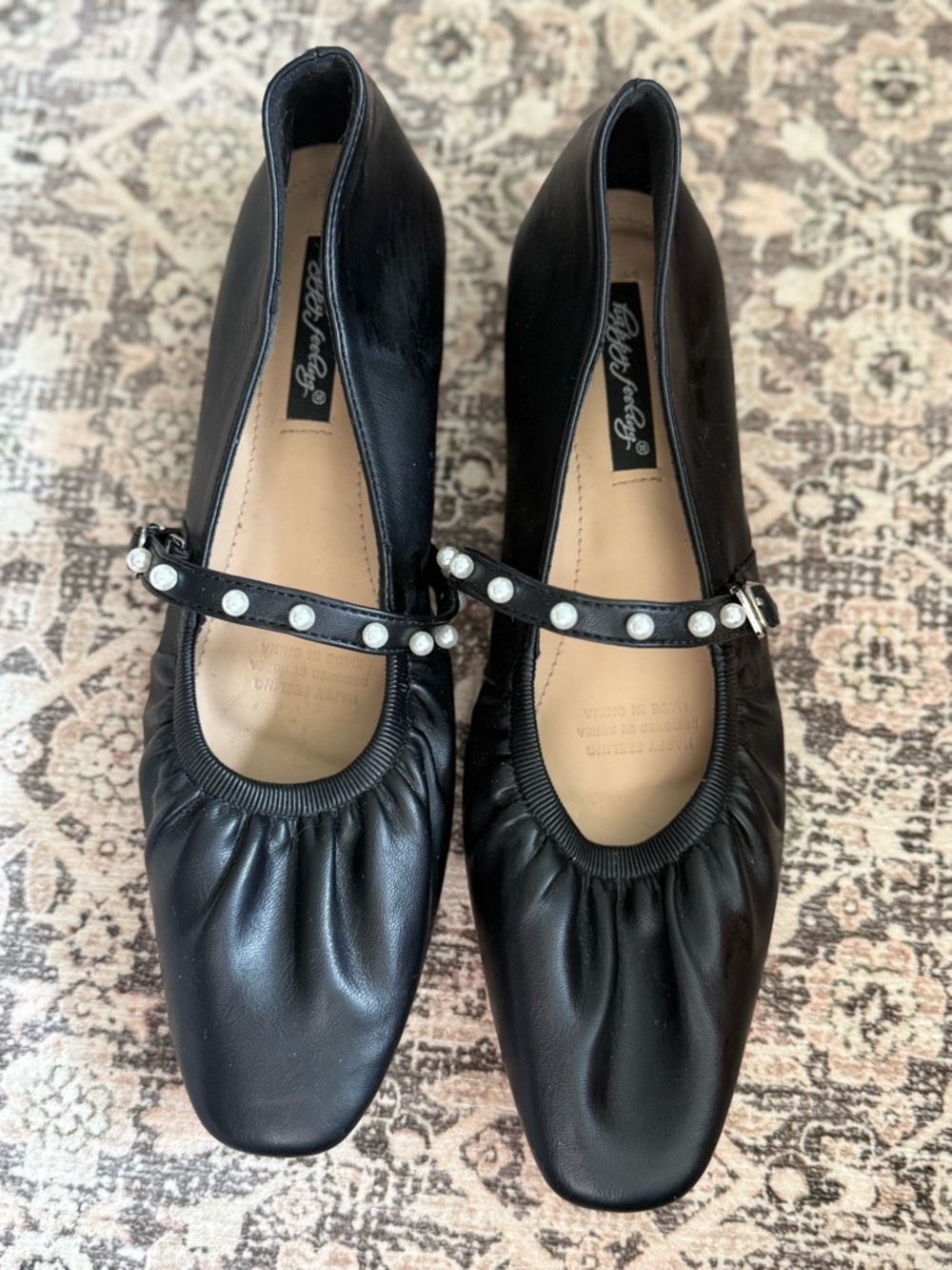Black Mary Jane pearl flats